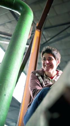 Isabelle Legeron standing by a market stall