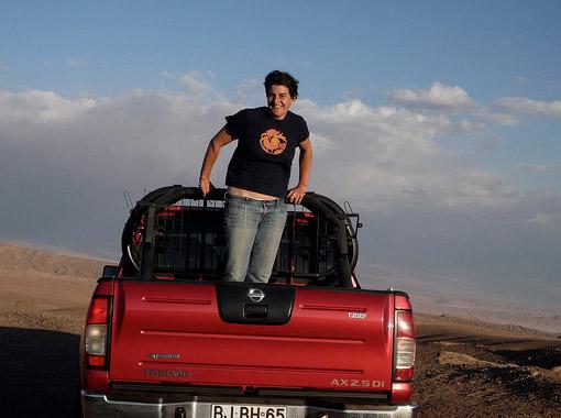 Isabelle Legeron out and about by a red pickup truck in the Atacama, Chile